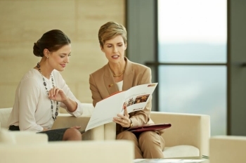 female financial advisor consulting with client